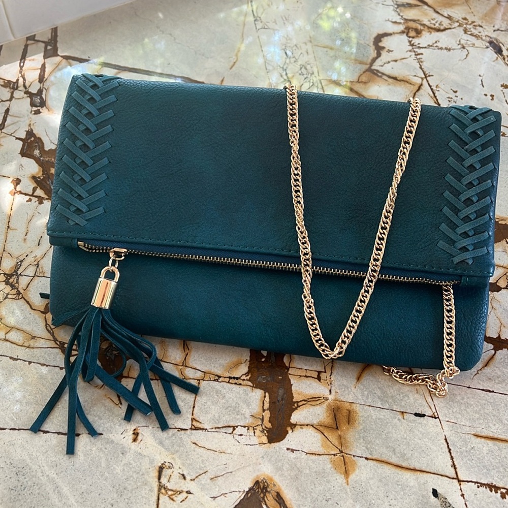 11.75” across 7.25” width folded 12.5” unfolded brand new stitch fix teal clutch
